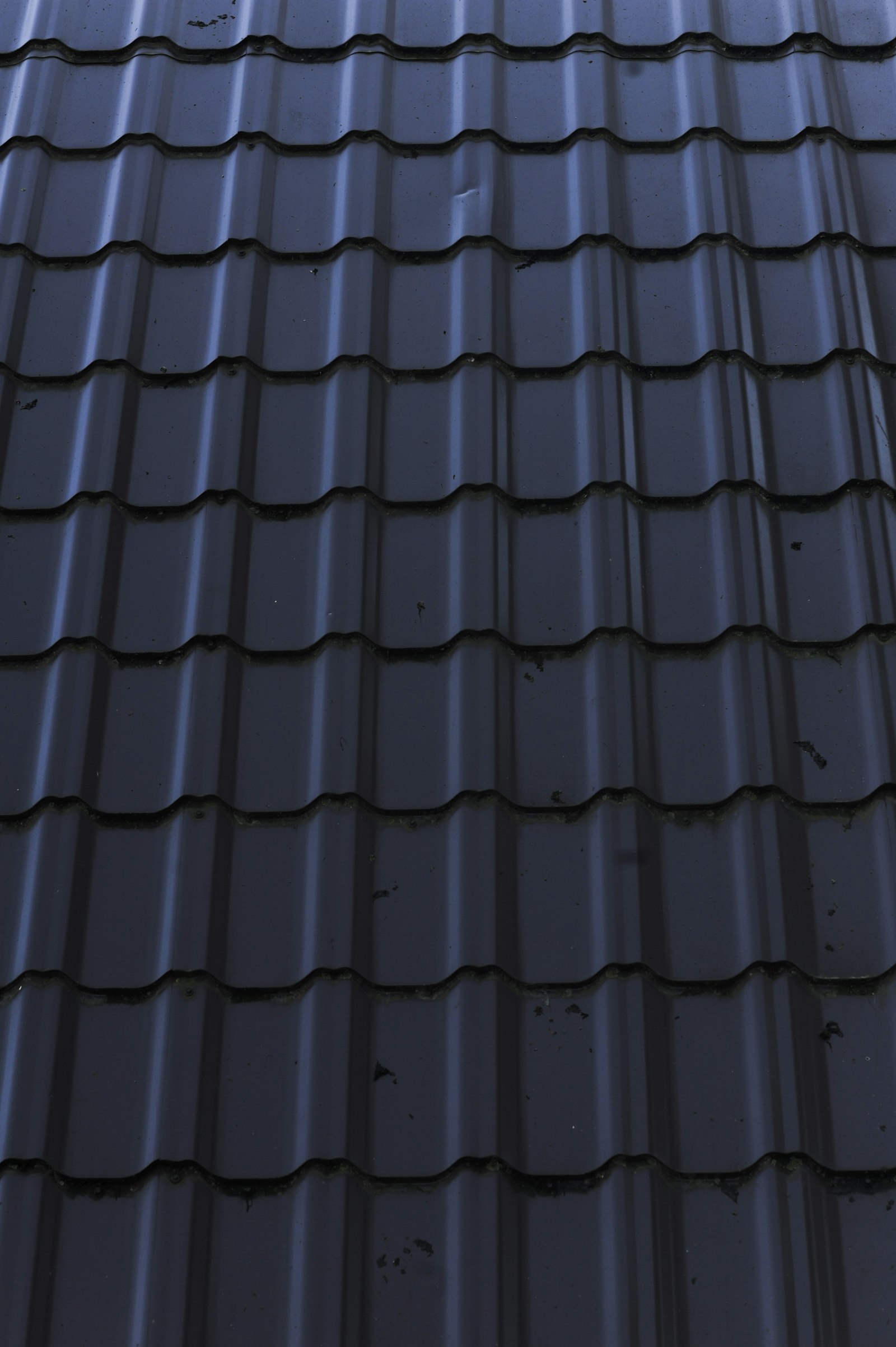 Close-up of a metal roof, a popular commercial roofing option on the Gold Coast Close-up of a durable metal roof, a popular choice for commercial buildings on the Gold Coast