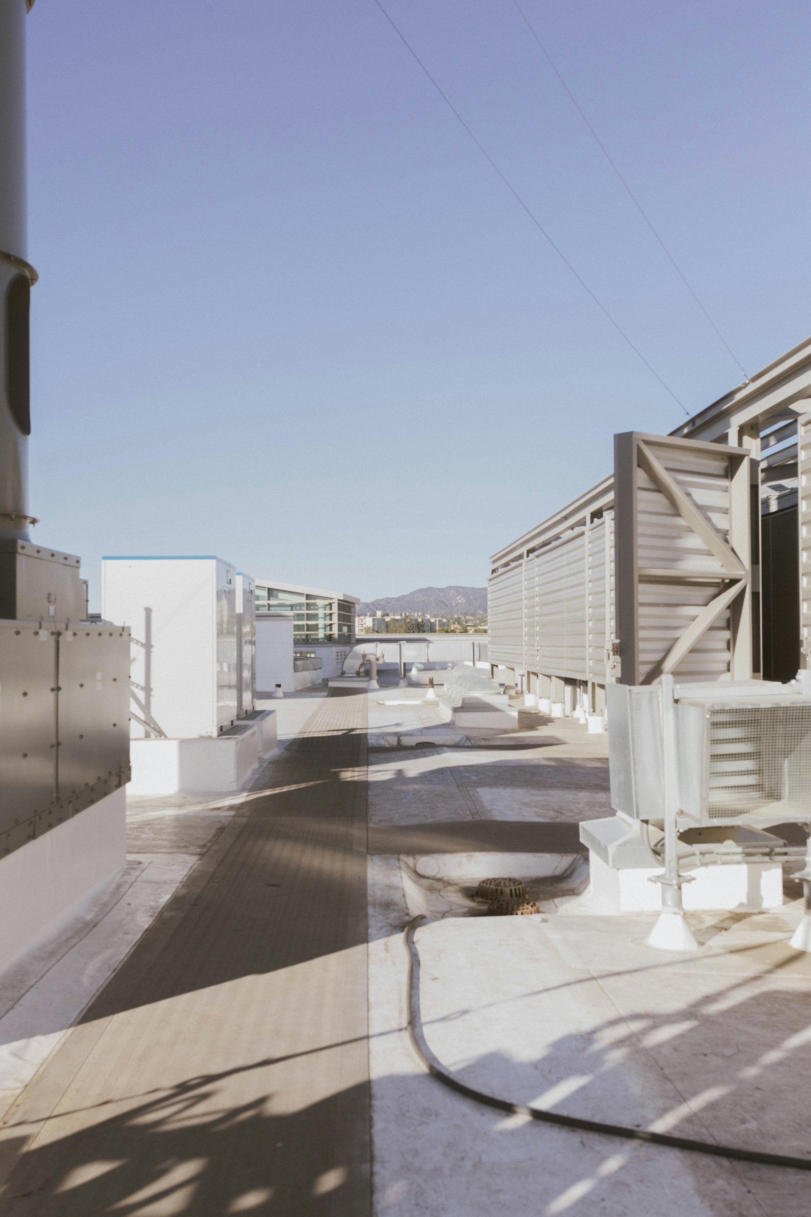 Flat rooftops on a row of commercial and industrial buildings
